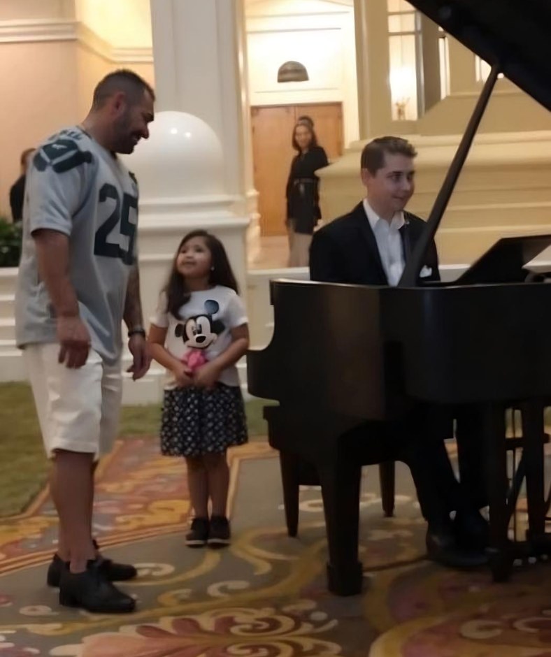 The daughter asked the pianist to play, and the father started to sing.