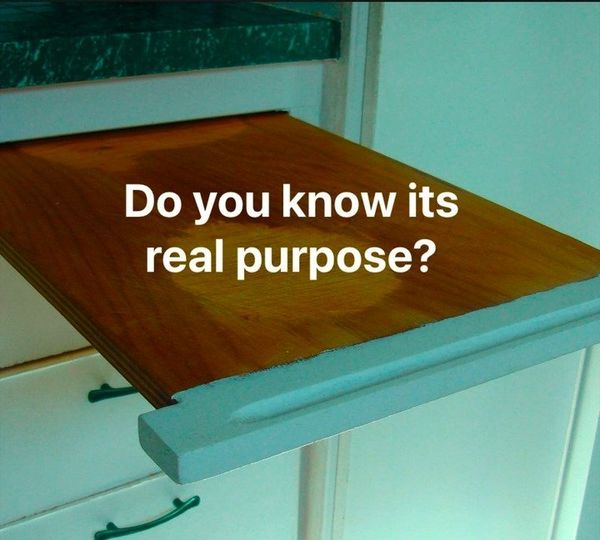 The Real Reasons Older Kitchens Have Pull-Out Cutting Boards