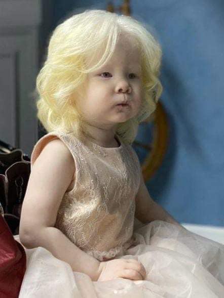 Two albino sisters from Kazakhstan born 12 years apart become modeling sensation